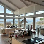 With Sunny Terraces And Sea Views